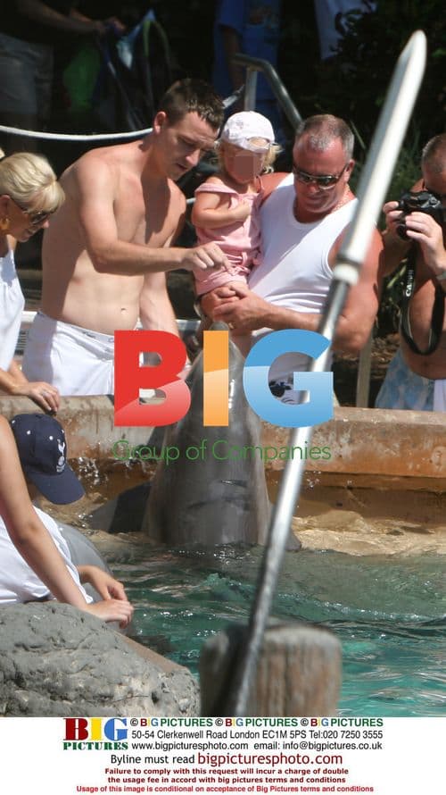 John Terry with family at theme park