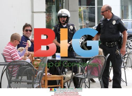 Luke Wilson and friends chat with police