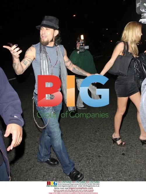 Dave Navarro leaves bar with mystery woman