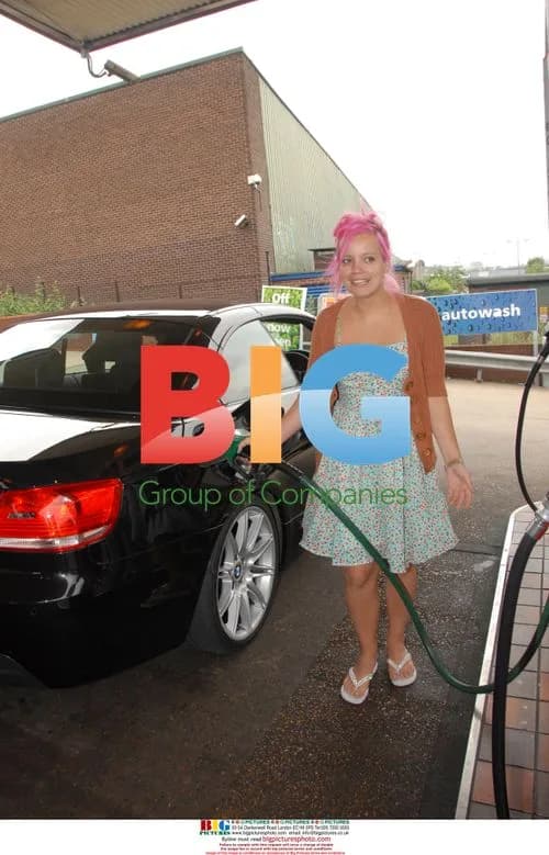 Lily Allen filling up at service station