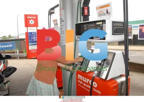 Singer Lily Allen fills up for petrol in London