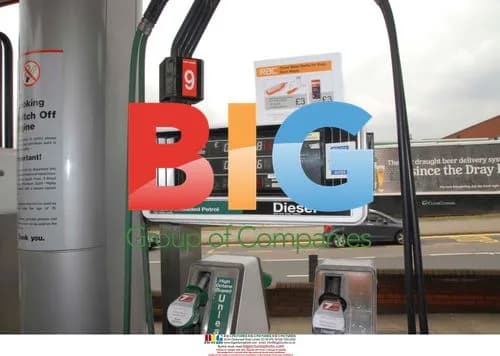 Singer Lily Allen fills up at a service station in London