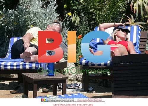 Chris Tarrant and Partner Jane Bird in Spain