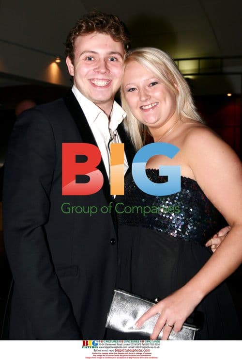 Tom Hudson and guest at charity event