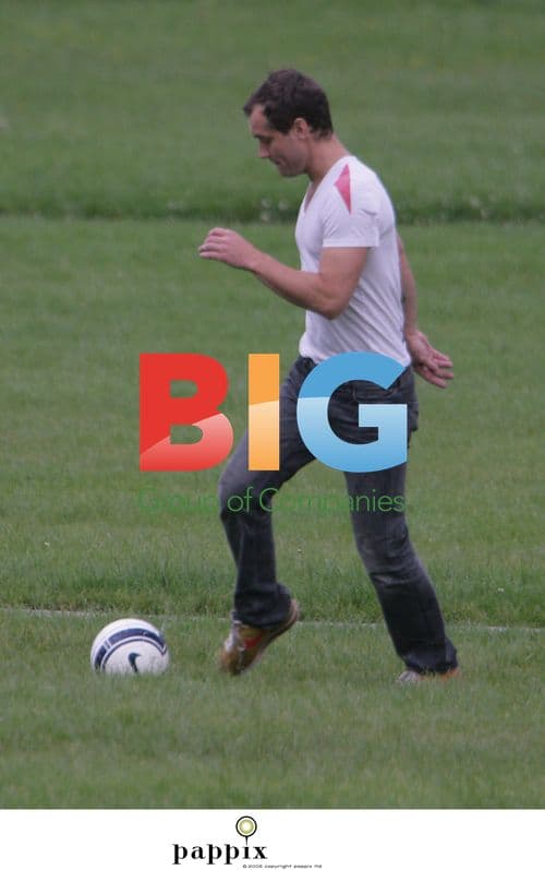 Jude Law plays football with son Rudy