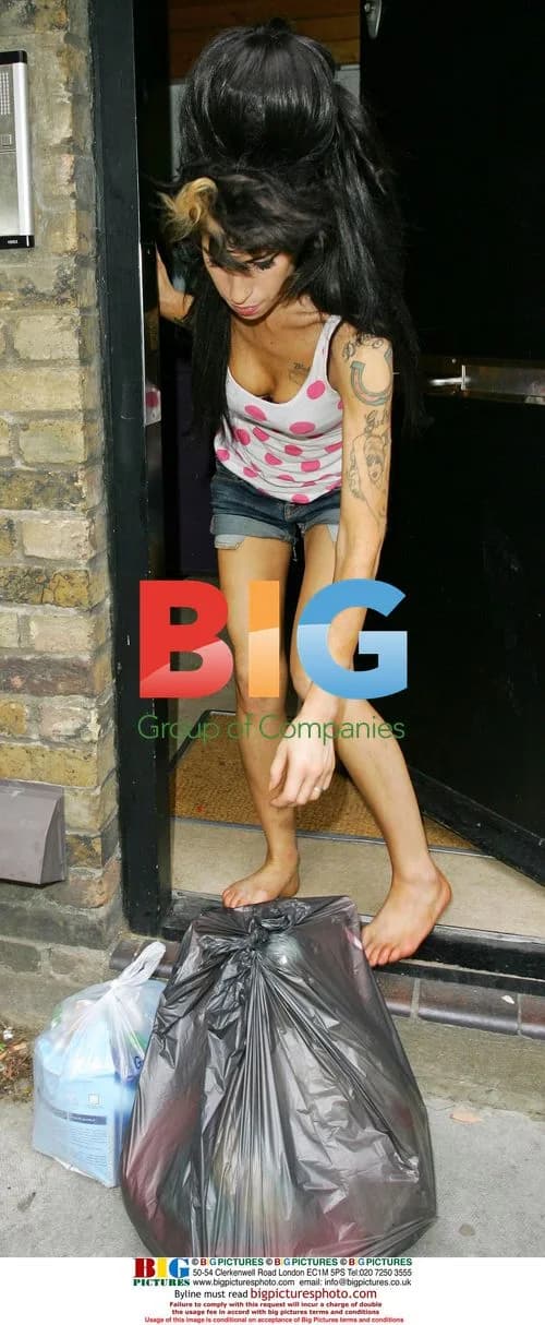 Amy Winehouse with cats, London 2008