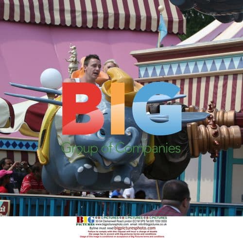 John Terry Relaxes with Family at Theme Park