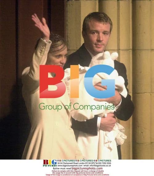 Madonna, Guy Ritchie and son Rocco at baptism