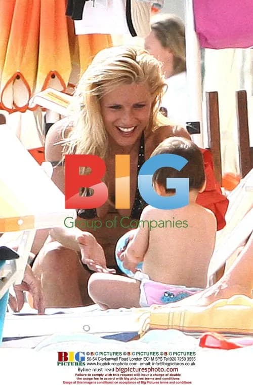 Michelle Hunziker at the beach in Varigotti, Italy