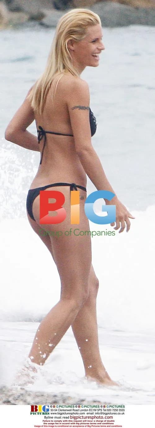 Michelle Hunziker at the Beach in Varigotti, Italy