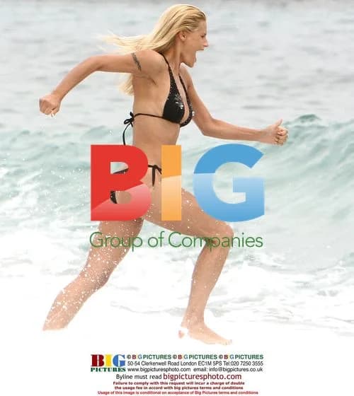 Michelle Hunziker at the beach in Italy