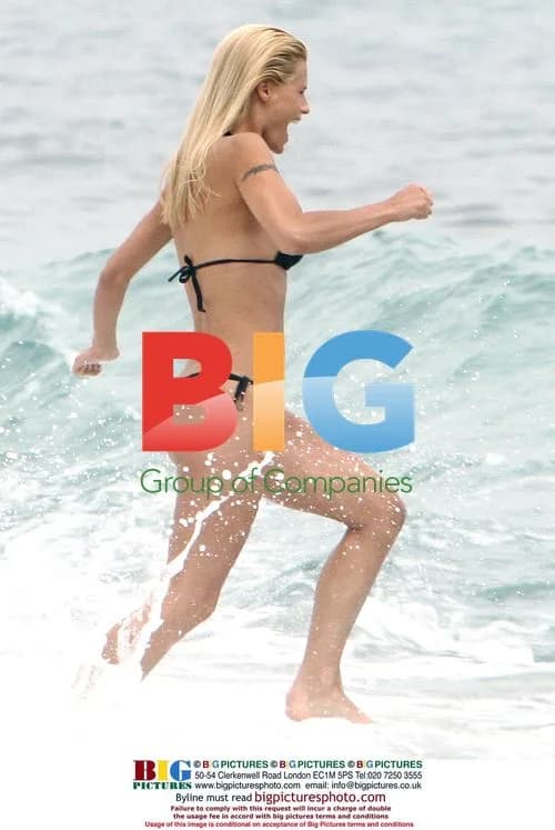 Michelle Hunziker at the beach in Italy