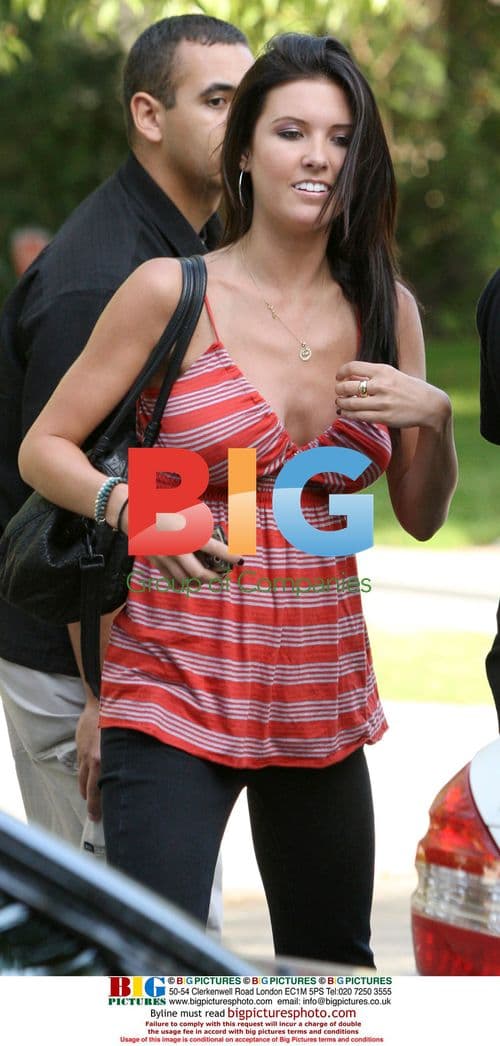Audrina Patridge arrives home with security