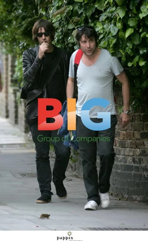 Liam Gallagher in Loose Jeans and Leather Jacket