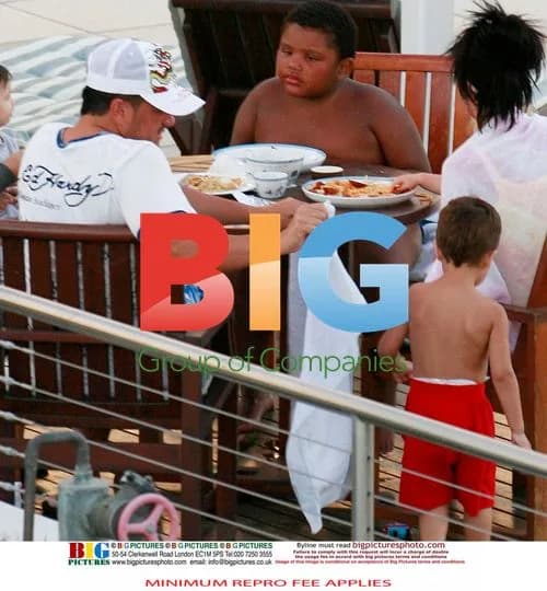 Katie Price with family at hotel pool