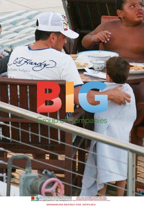 Katie Price with family at hotel pool