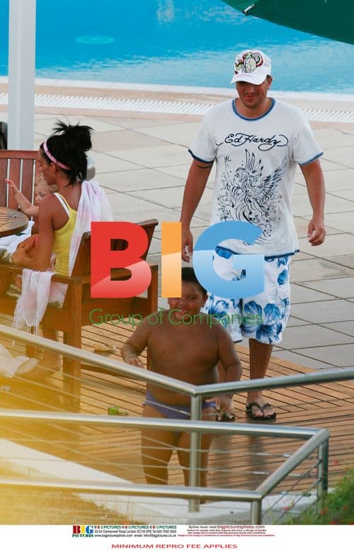 Katie Price with family at hotel pool