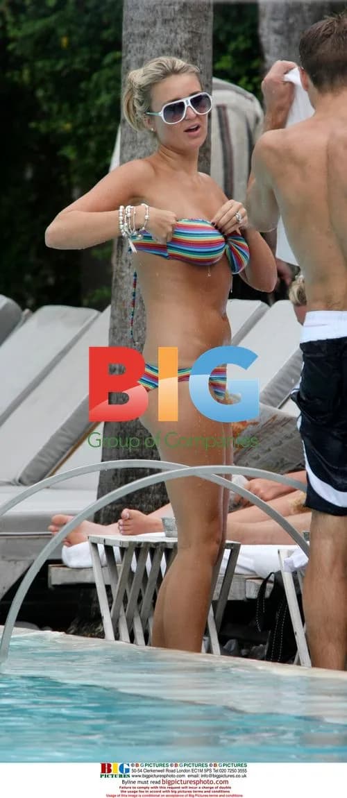 Steven Gerrard and wife Alex in Miami pool