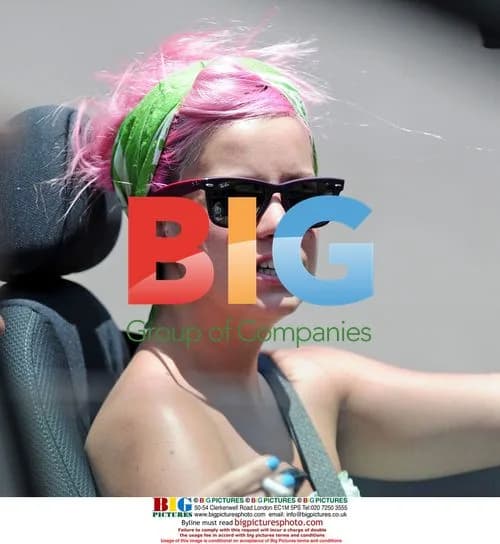 Lily Allen drives convertible Mini Cooper
