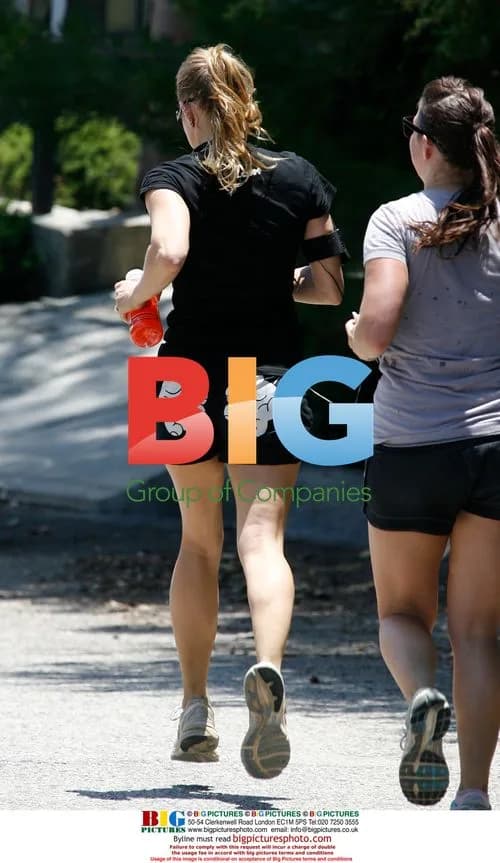 Fergie jogging with friends