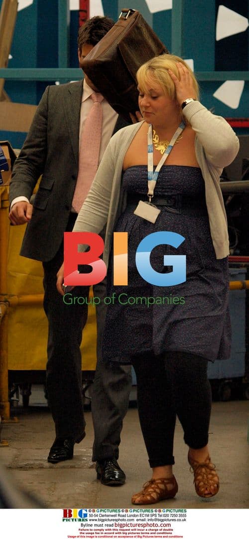 Apprentice star Lee McQueen shields face