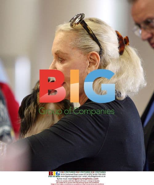 Lauren Bacall departs LAX with pet dog