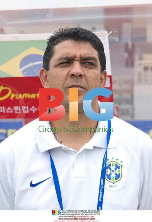 Brazilian coach watches players at Peace Queen Cup