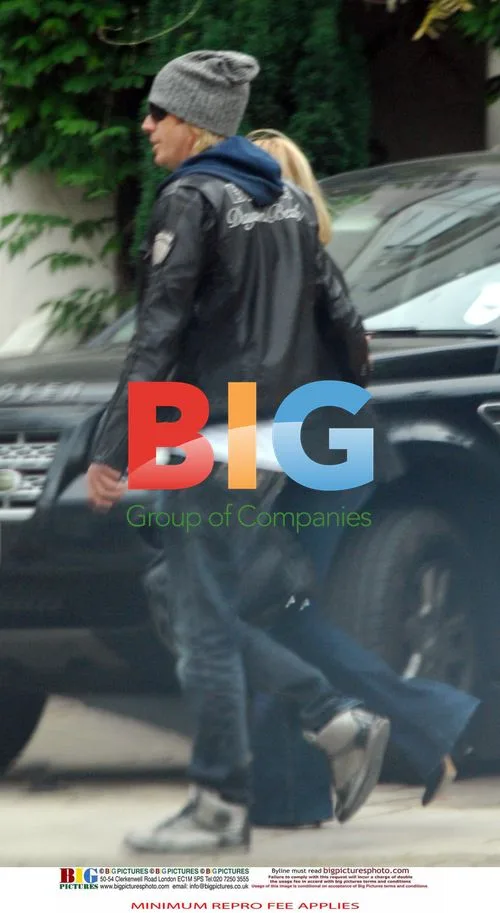 Rhys Ifans with mystery woman