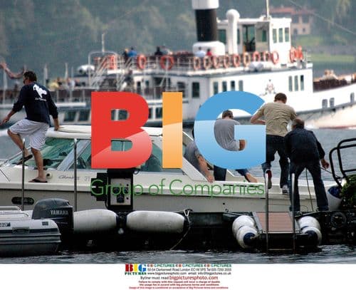 George Clooney on Boat in Italy