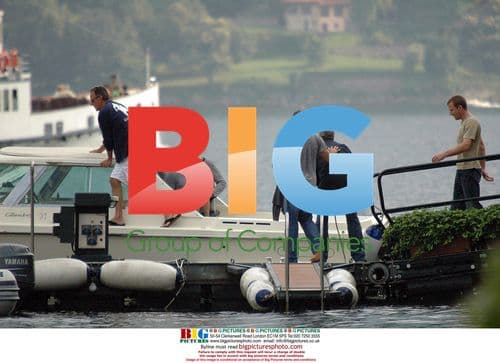 George Clooney on boat in Como, Italy
