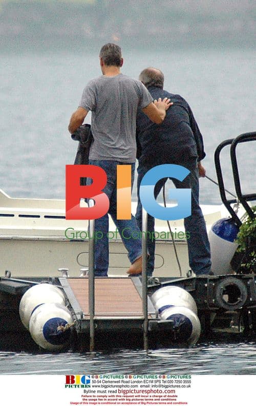 George Clooney on Boat in Italy