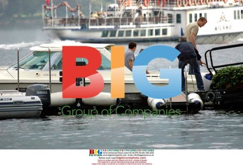George Clooney on Boat in Italy