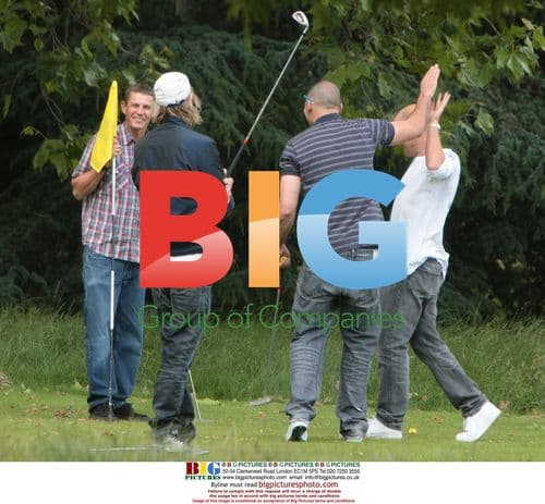 Rhys Ifans plays pitch and putt in London