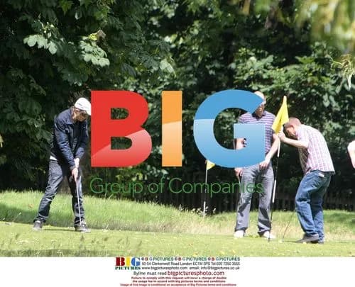 Rhys Ifans plays pitch and putt in London