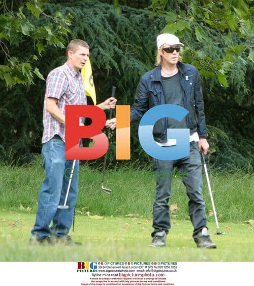 Rhys Ifans plays pitch and putt in London