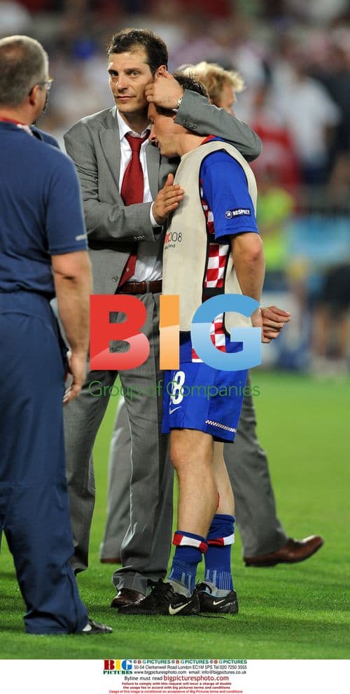 Slaven Bilic consoles Ivica Olic after defeat