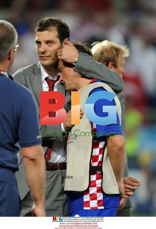 Slaven Bilic consoles Ivica Olic after Croatia-Turkey match