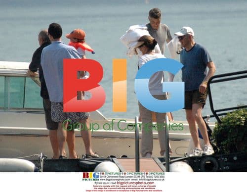 George Clooney on Boat at Lake of Como