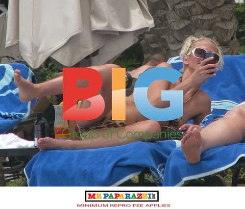 Sarah Harding Checks Phone After Breakup