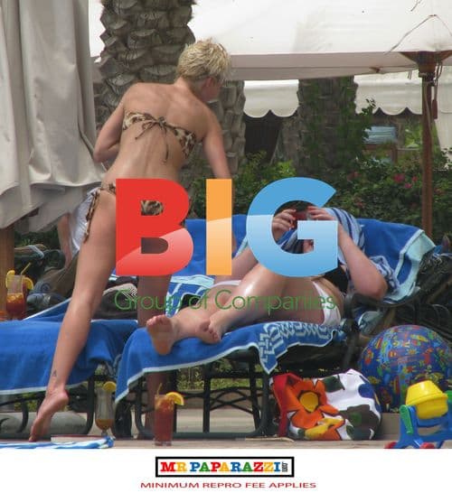 Sarah Harding checks phone after breakup