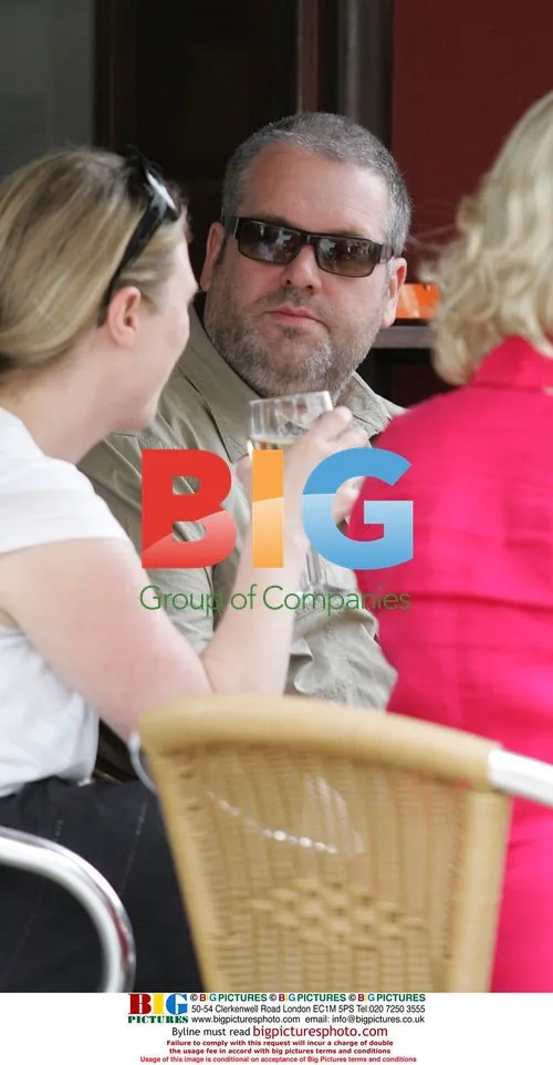 DJ Chris Moyles enjoys drink with colleagues