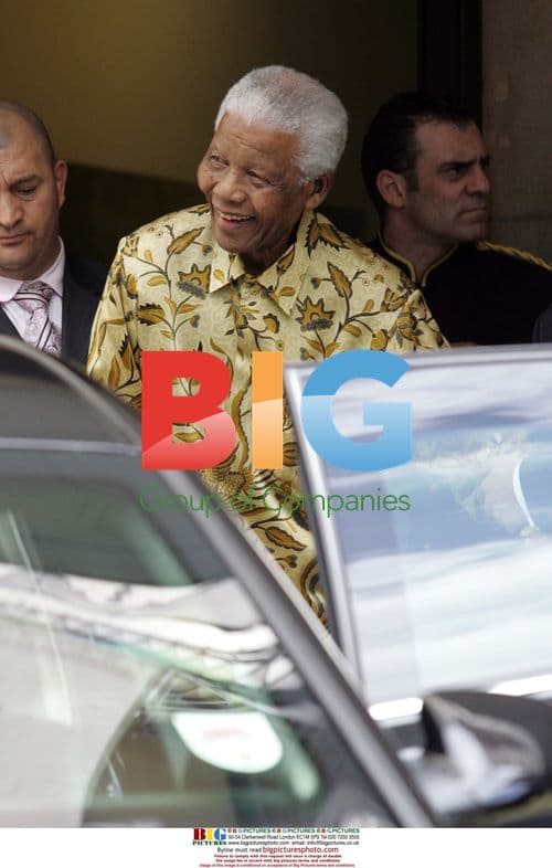 Nelson Mandela and wife leave London hotel