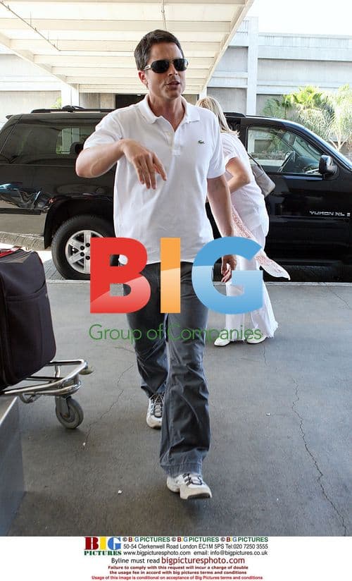 Rob Lowe arriving at LAX with family