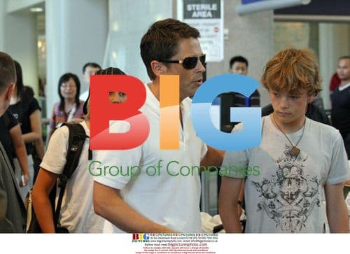 Rob Lowe arriving at LAX with family
