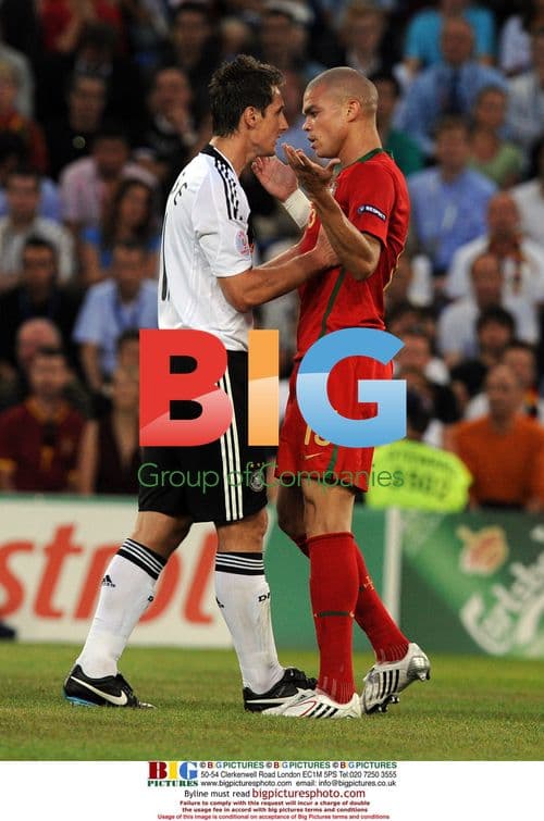 Klose and Pepe at Euro 2008 Quarter Final