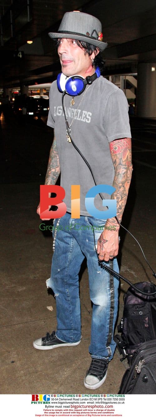 Tommy Lee and Deryck Whibley Arrive at LAX