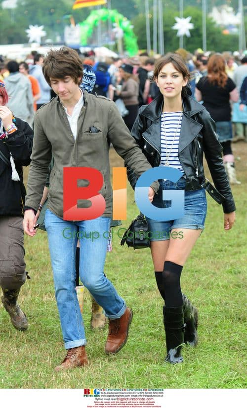 Celebs brave muddy Glastonbury Festival