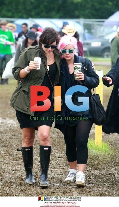 Celebrities brave Glastonbury mud and rain
