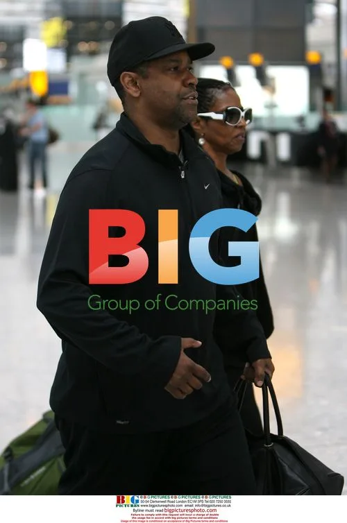 Denzel Washington and wife depart Heathrow