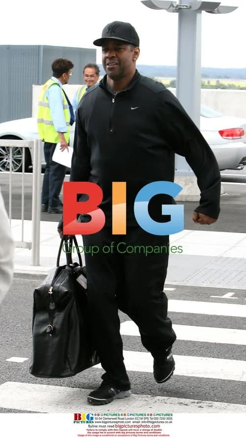Denzel Washington and wife Pauletta depart Heathrow airport